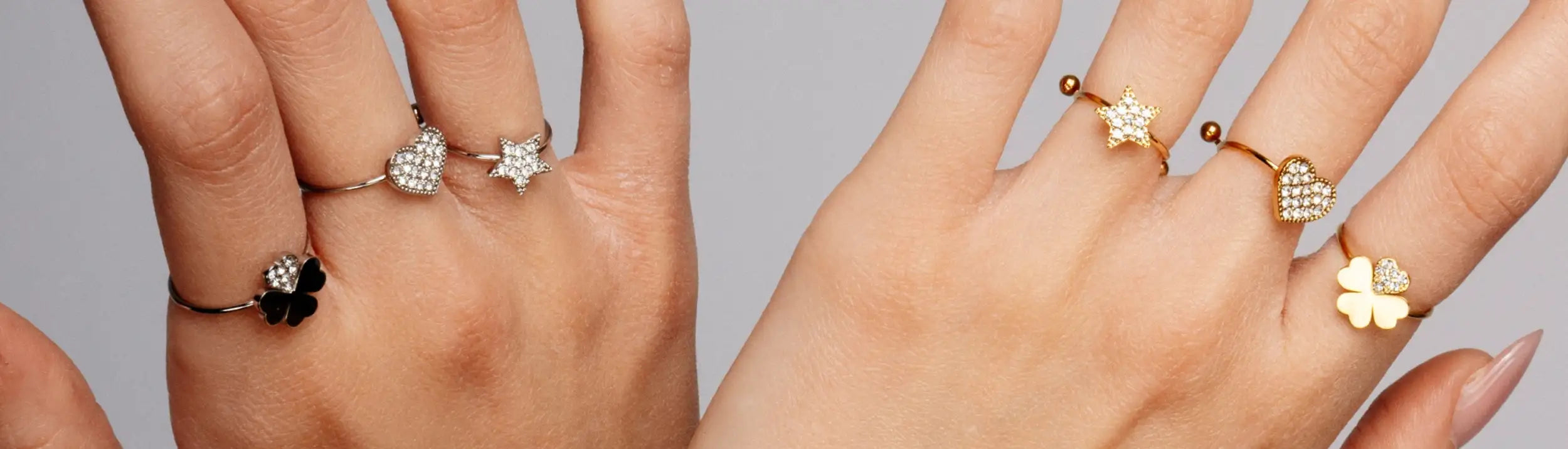 Un anello delicato con tonalità oro che presenta un design a stella incastonata di diamanti scintillanti.